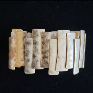 Gold stretch cuff bracelet. Costume jewelry, fashion jewelry, statement jewelry.